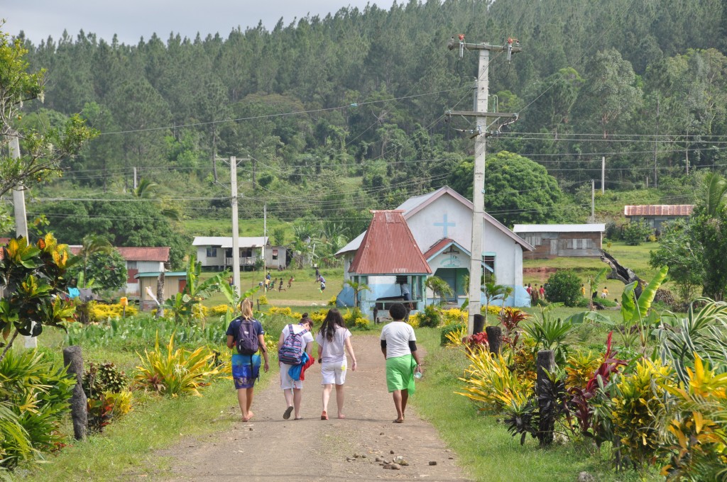 Walking through the village. The church, the most important building in the village, is on the right of the road.