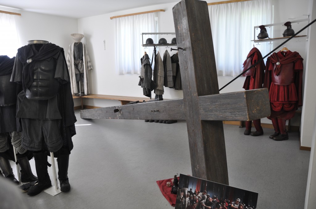 Costume of Pontius Pilate from 2010 on the left and Romans on the right. The hollow wooden cross is 18ft tall and 120 lbs.